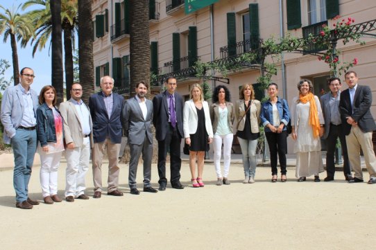 Foto de família de tots els assistents a la visita