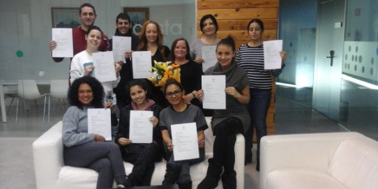 Foto de família de l'acte de lliurament dels certificats.